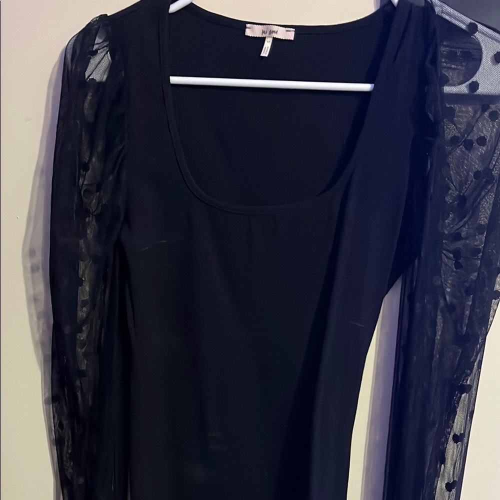 Francesca’s
Black Sheer Sleeve Top